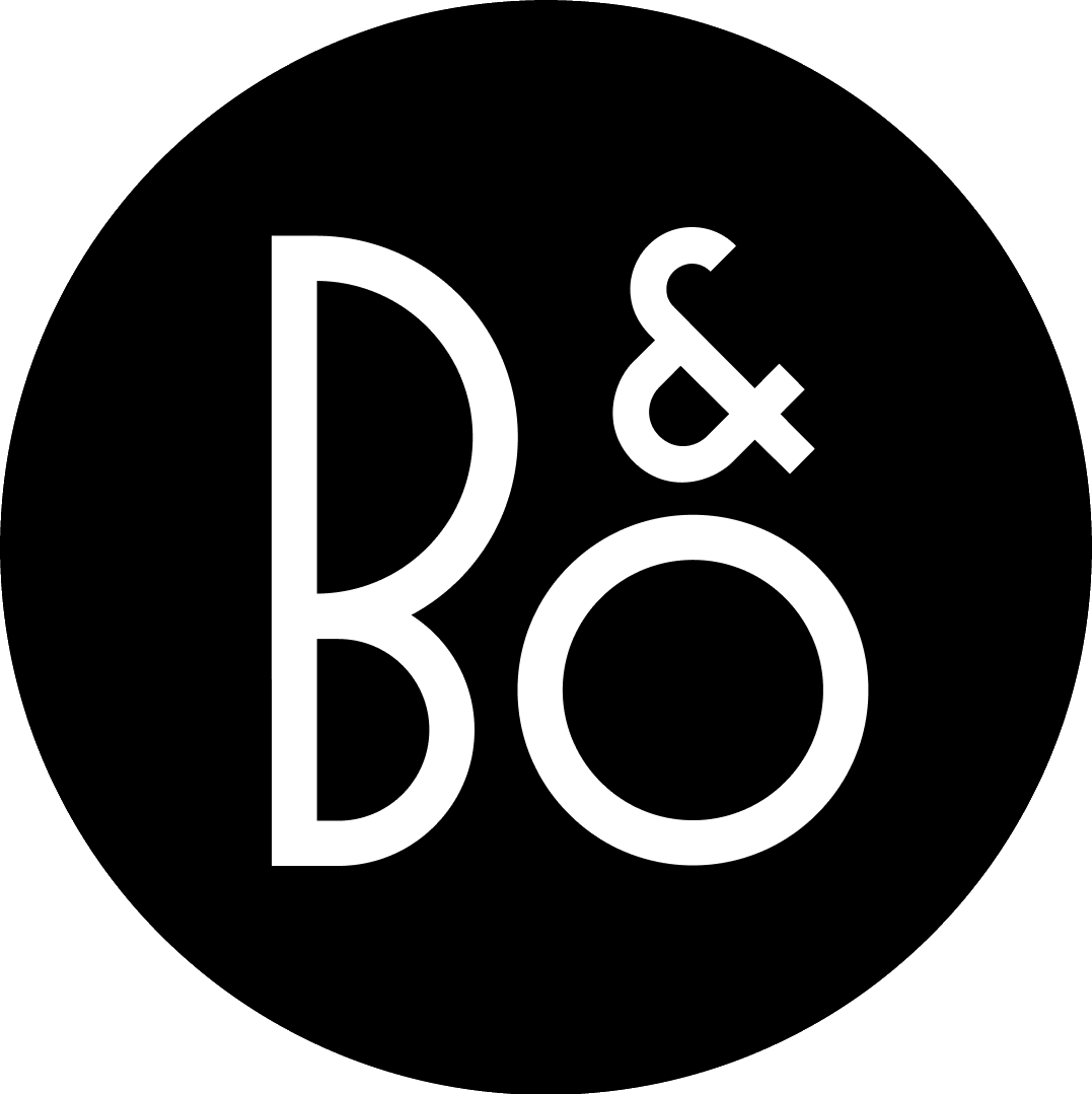 Rundes Bang & Olufsen Logo (Roundel) mit weißem B&O-Schriftzug auf schwarzem Kreis. Freigestelltes PNG-Format für die Verwendung als Browser-Favicon, Social-Media-Profilbild oder App-Icon im LuxusSound Onlineshop.