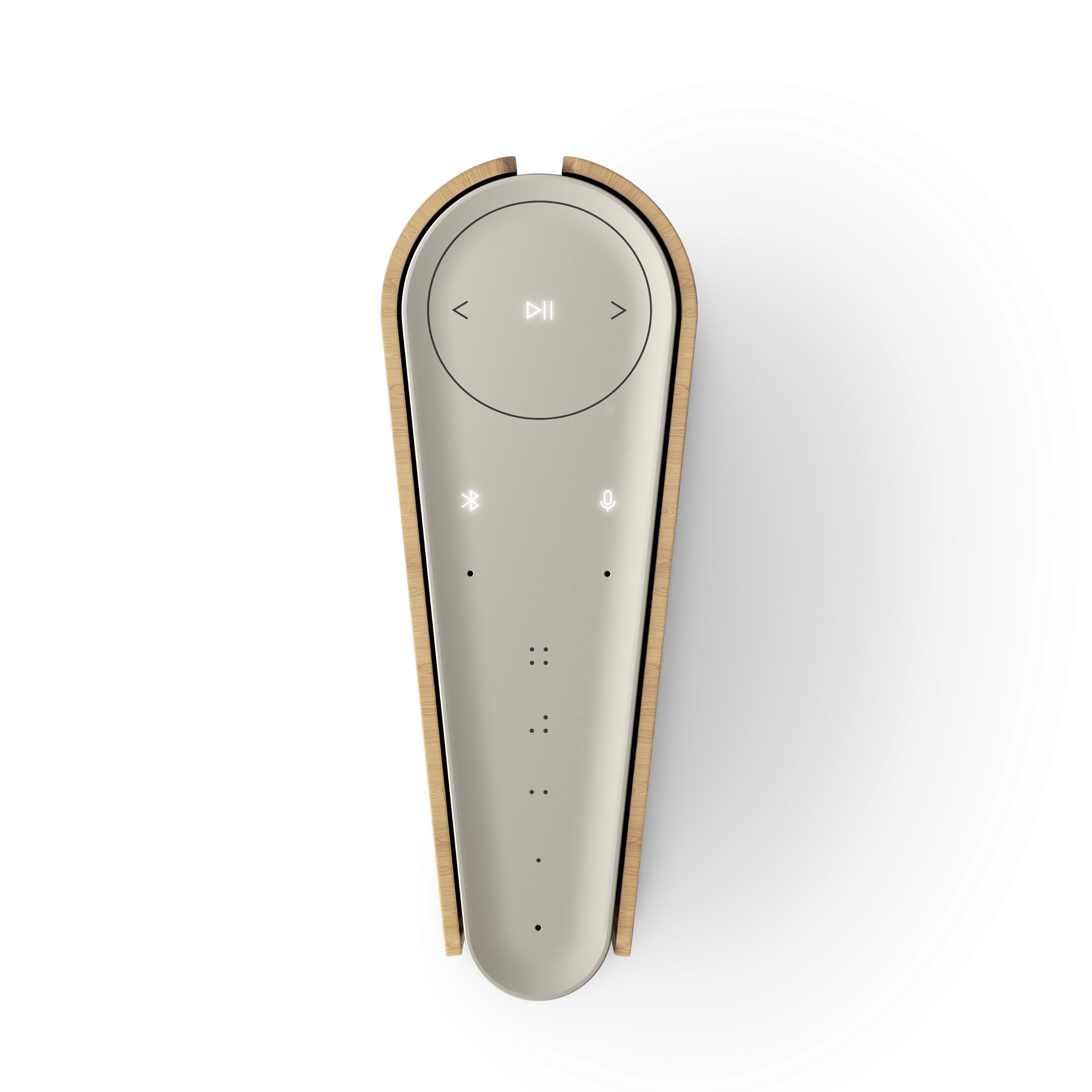 Vogelperspektive der Bang & Olufsen Beosound Emerge in Gold Tone. Die Aufnahme zeigt die extrem schlanke, buchähnliche Silhouette des Lautsprechers von oben mit dem beleuchteten Touch-Interface und den markanten Seitenpaneelen aus heller Eiche auf weißem Hintergrund.